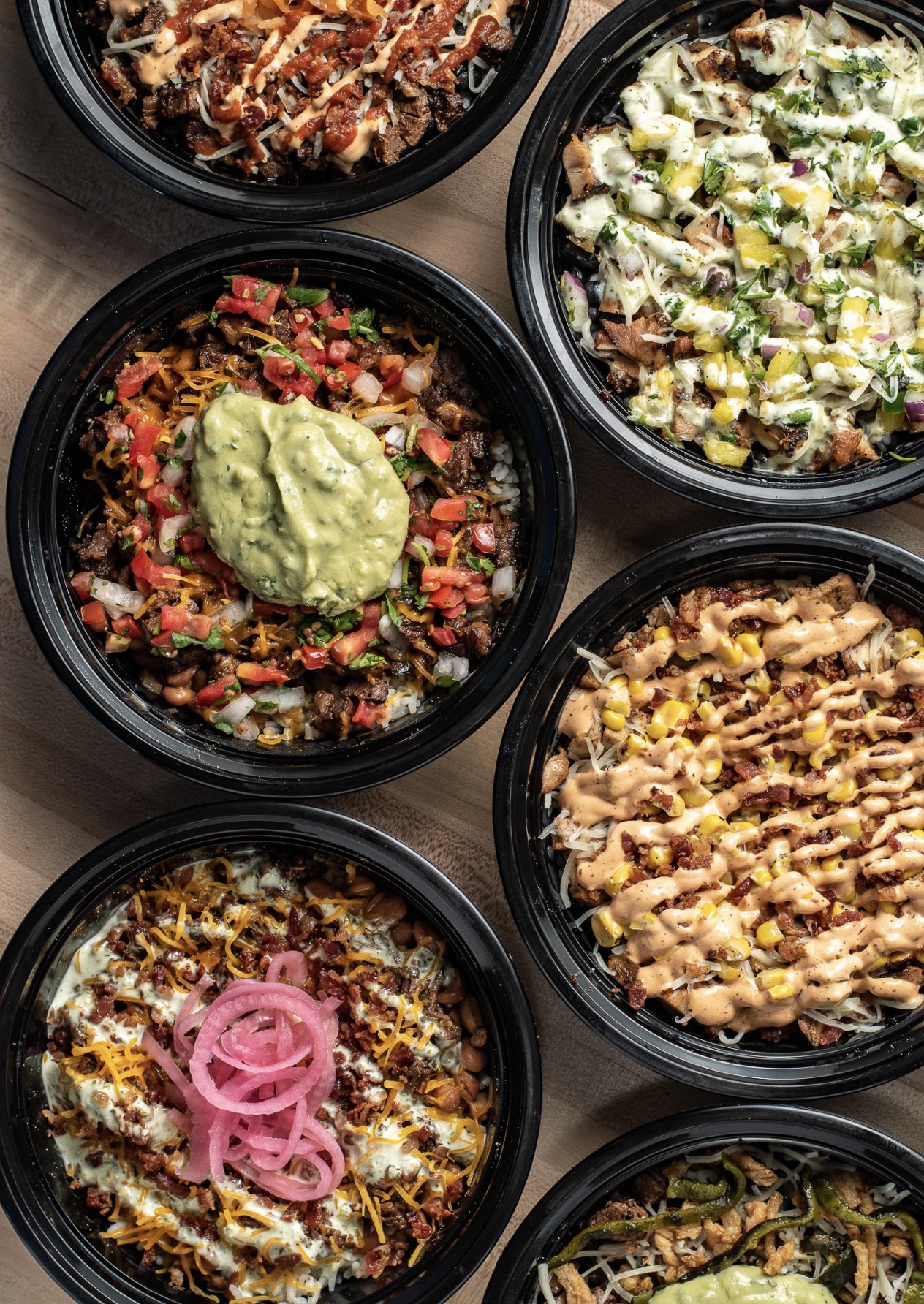 Toro Loco bowls with different toppings